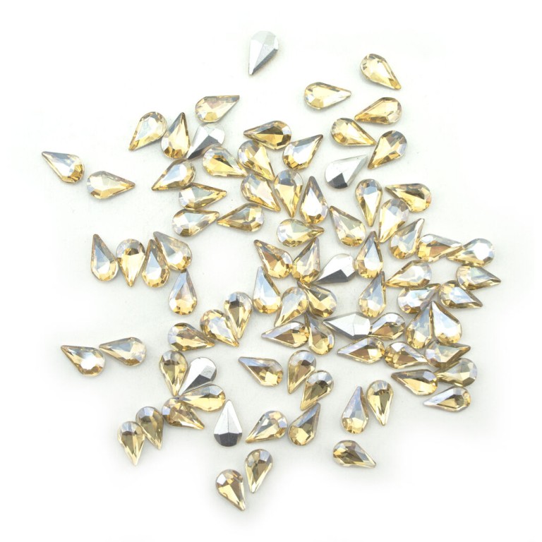 HAND® AB Champagne Crystal Glass Teardrop Sew On Embellishments with Silver-Grey Tone Backing - 8 x 13mm - Pack of 50 HAND® AB Champagne Crystal Glass Teardrop Sew On Embellishments with Silver-Grey Tone Backing - 8 x 13mm - Pack of 50