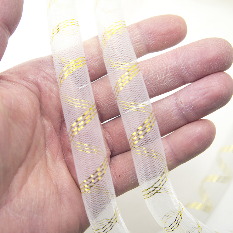 HAND White with Gold Trim Elastic Lightweight Millinery Tubular Crin Trim - diameter 16 mm, appx 24 meters per pack HAND White with Gold Trim Elastic Lightweight Millinery Tubular Crin Trim - diameter 16 mm, appx 24 meters per pack